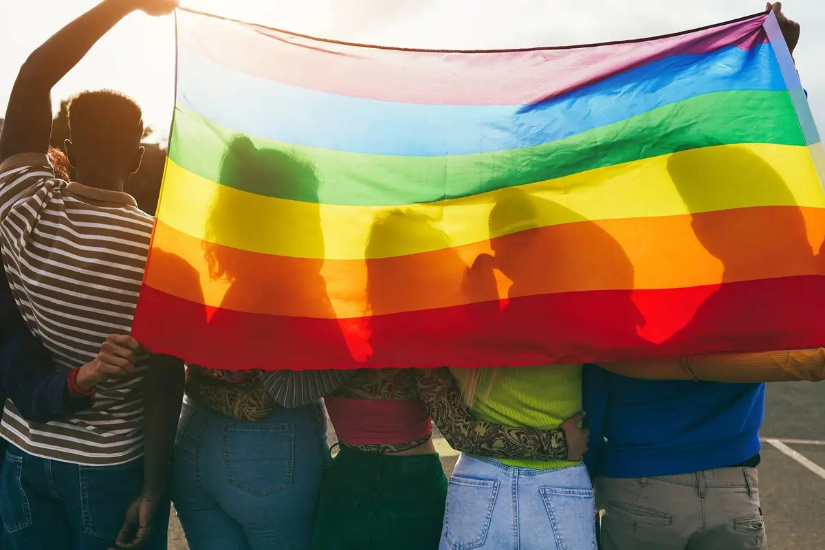 HIV-positive gay men protest Trump's border policies with *sigh* "Kiss-In"