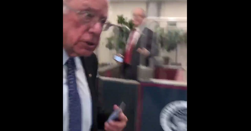 WATCH: Bernie Sanders FAKES a Phone Call to Avoid Question About Fairfax Accuser