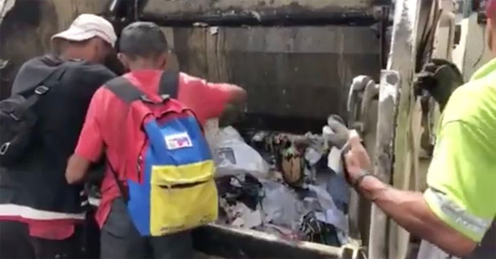 WATCH: Citizens Eating Out of Garbage Truck in the Socialist Paradise of Venezuela