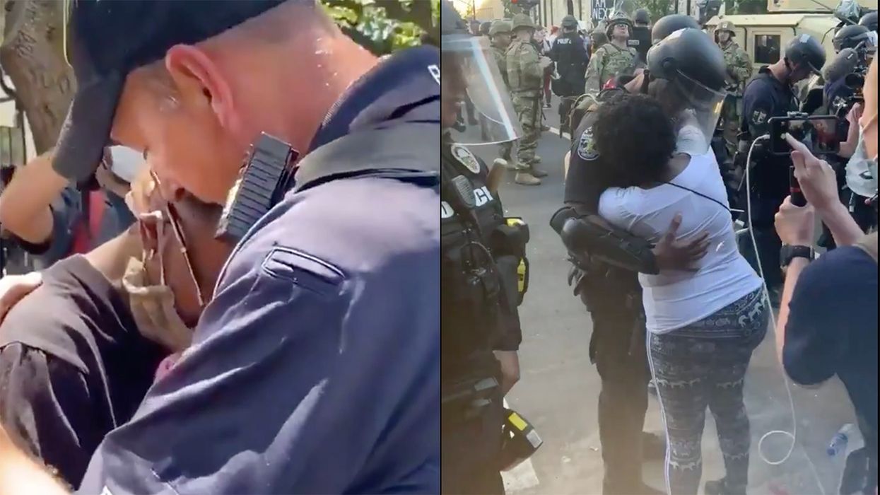 Watch as Two Cops and Two Protesters Hug It Out