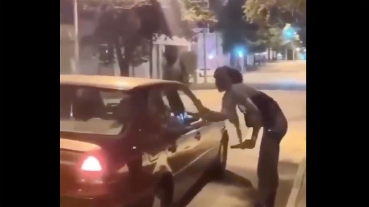 A White Liberal was Handing Out Bricks, But This Black Protester Wasn't Having It