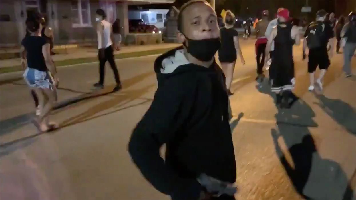 Peaceful Kenosha 'Protester' Points a Gun at Reporter