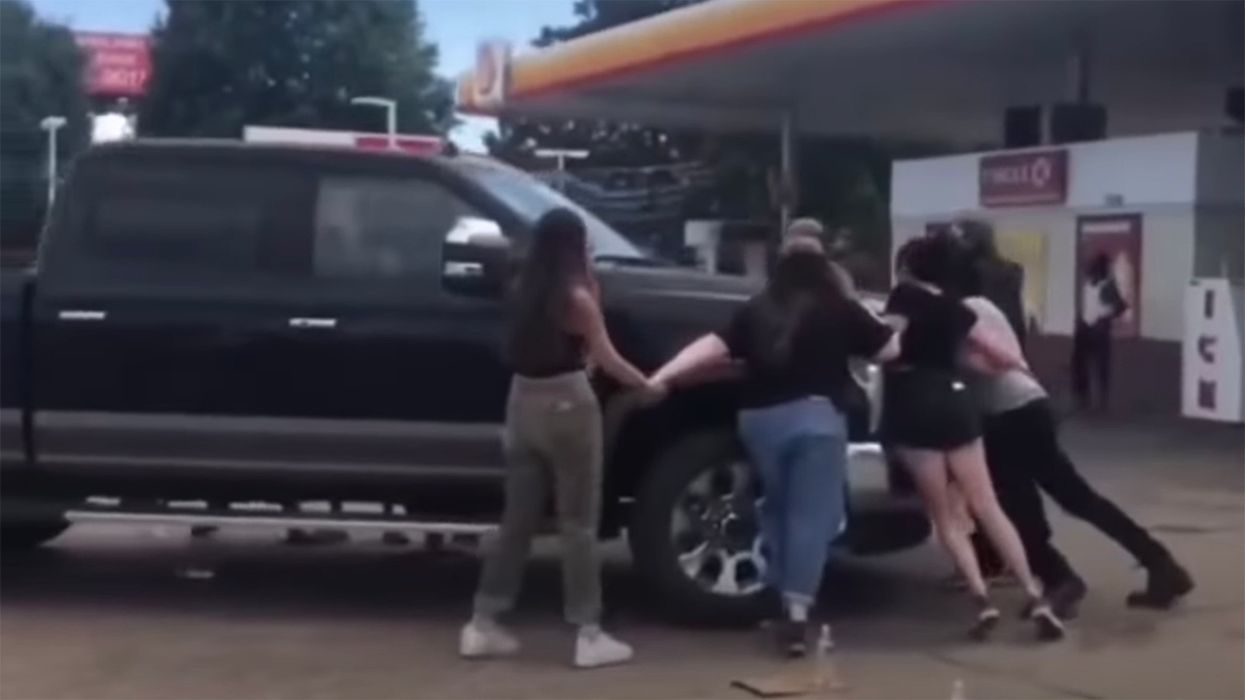 Truck Driver Not About to Let Obnoxious Protesters Stop Him from Getting Gas