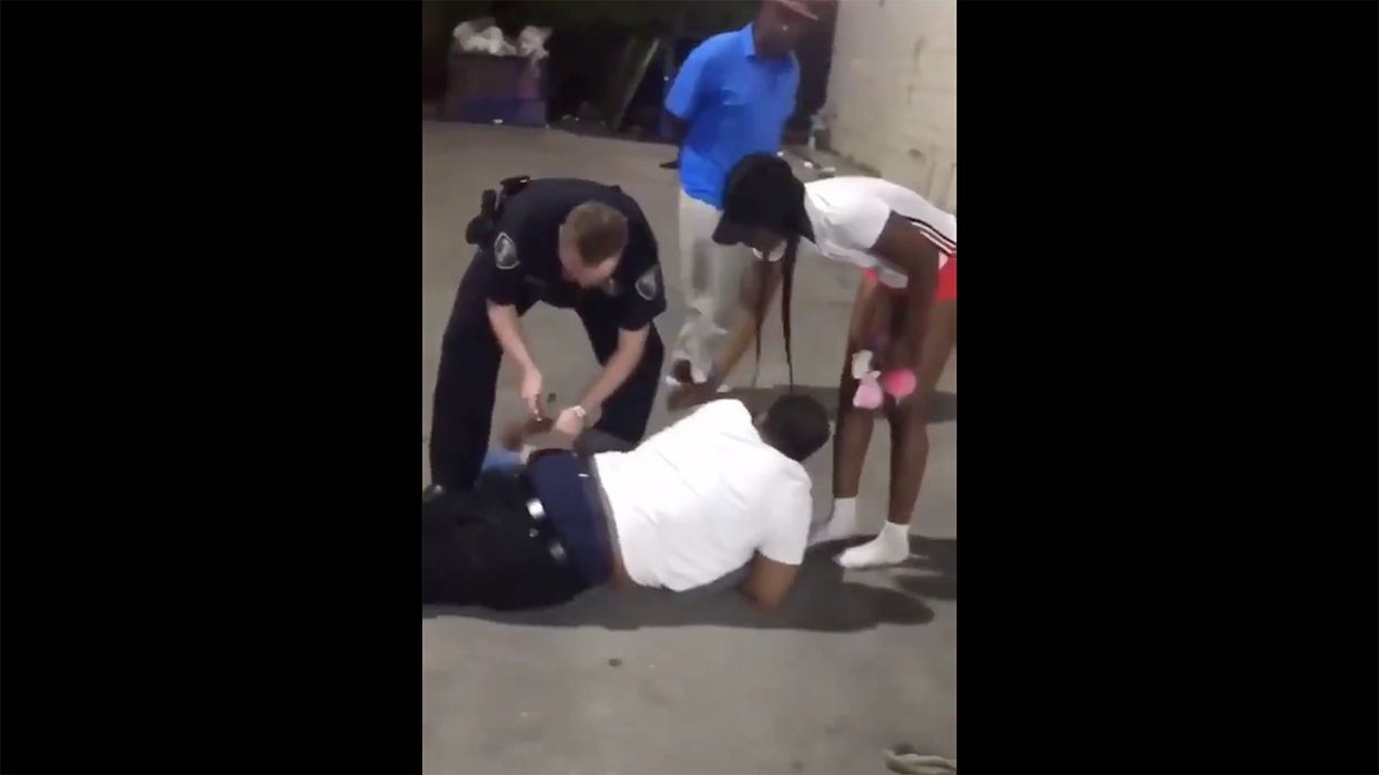 A Group of Black People Saw a White Cop Being Attacked, So They ... Defended Him?