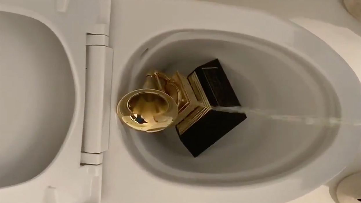 Kanye West Just Tweeted a Video of Himself Urinating on His Grammy. No, Really.
