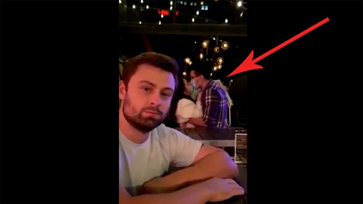 Watch: Couple Makes Out While Wearing Masks, Doesn't Understand How Masks or Kissing Works