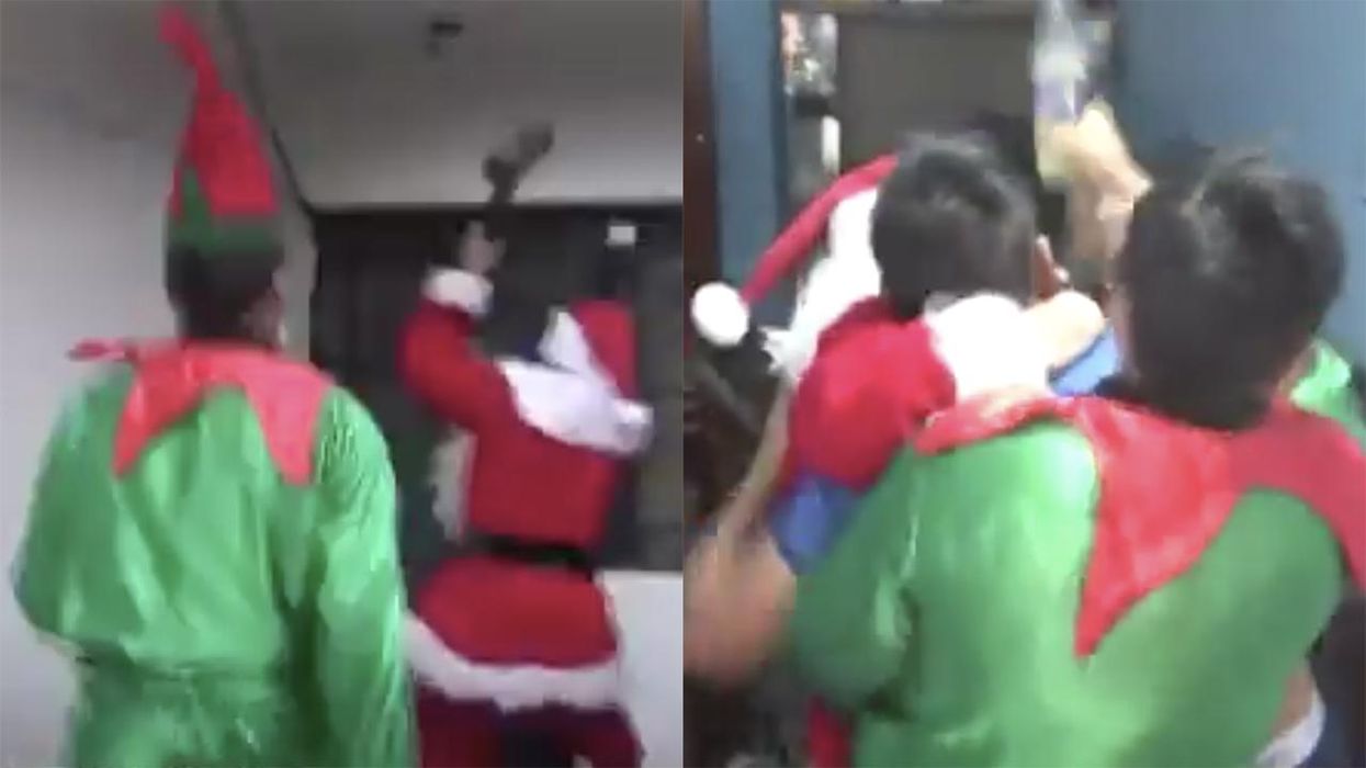 Watch: Santa Claus and his elves take down drug dealer after breaking down the door ... with a sledgehammer