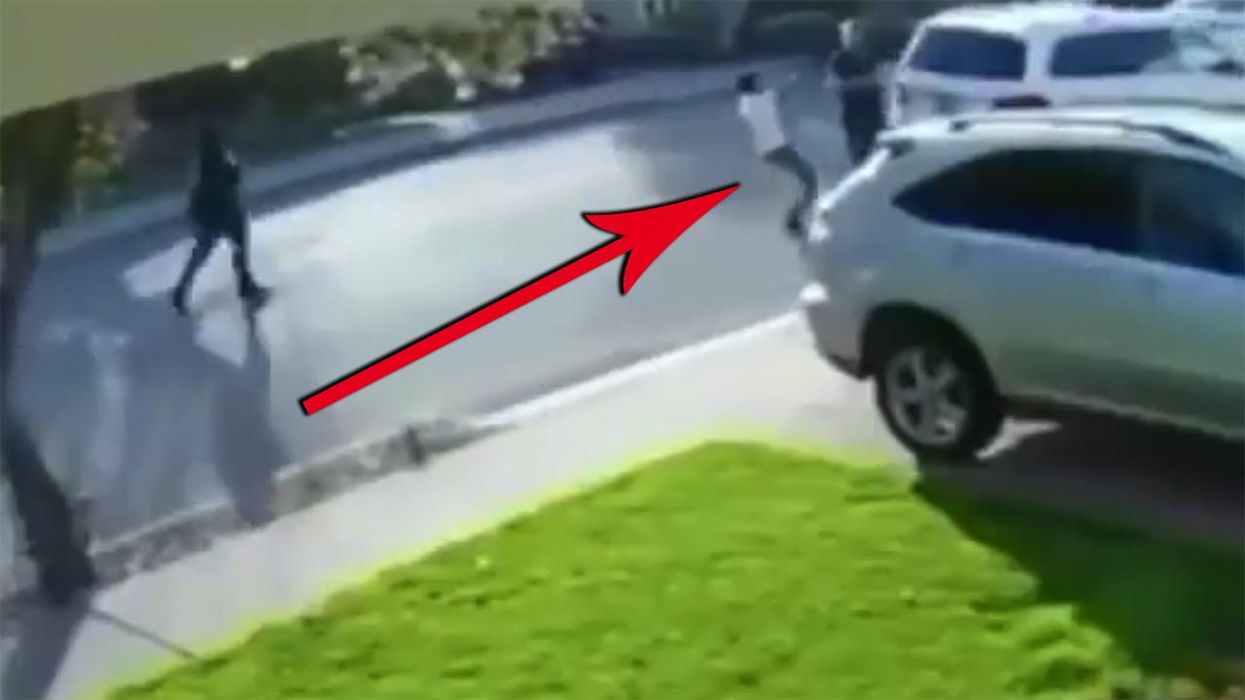 Watch: Dude attempts armed robbery, eats pavement and squeals like a pig instead
