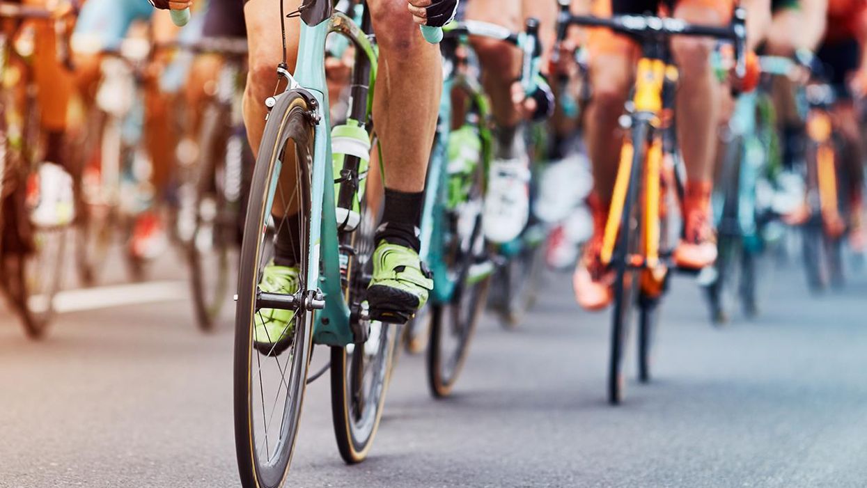 Photo Shows Biological Males Kiss After Taking 1st and 2nd in Women's Race, 3rd Place Female Holds Her Child