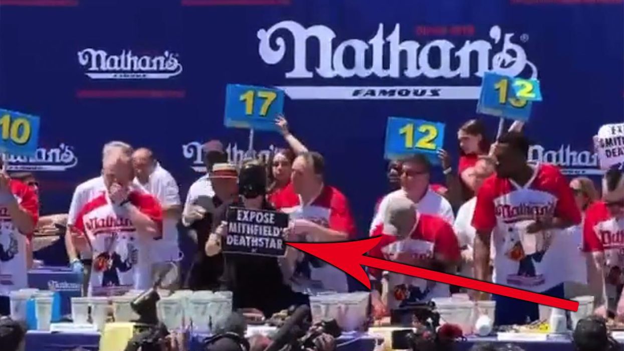 Animal Rights Activist Interrupts Hot Dog Eating Contest, is Choked Out By America's Greatest Living Athlete