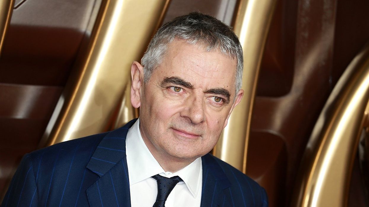 Rowan Atkinson is being accused of damaging EV sales over an Op-Ed he wrote last summer. Yes, the "Mr. Bean" actor.