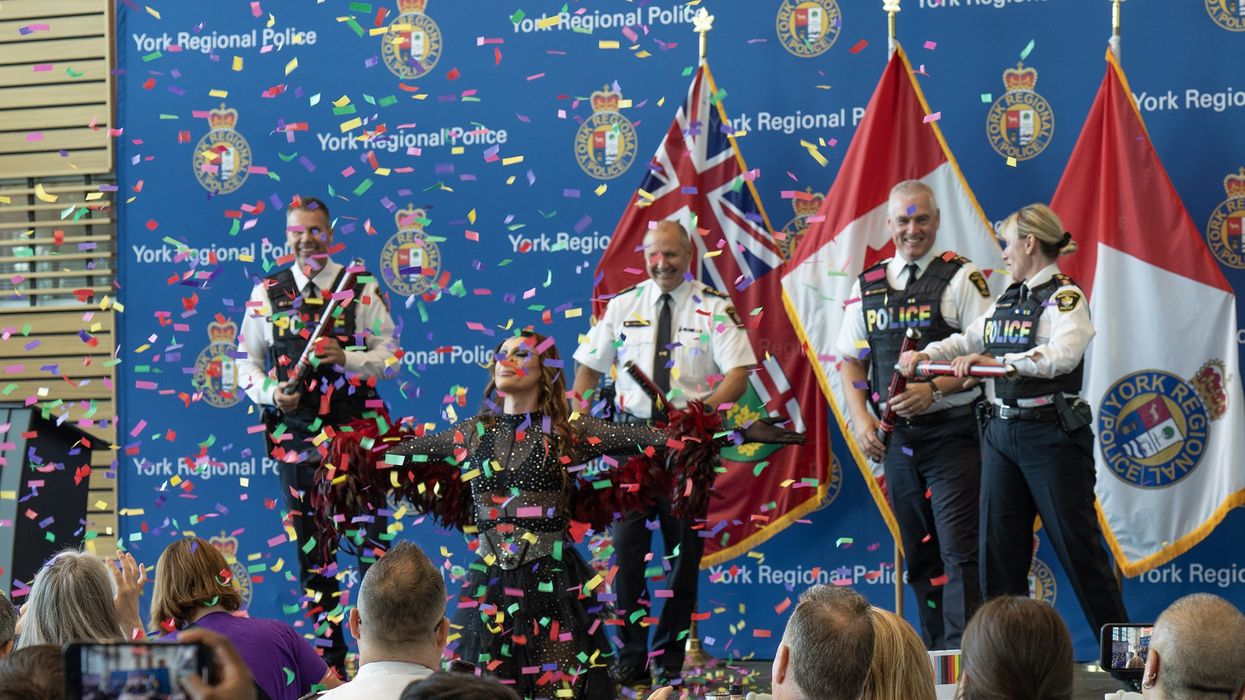 Watch: Police department holds "drag and donut" benefit to raise money for LGBTQ activists