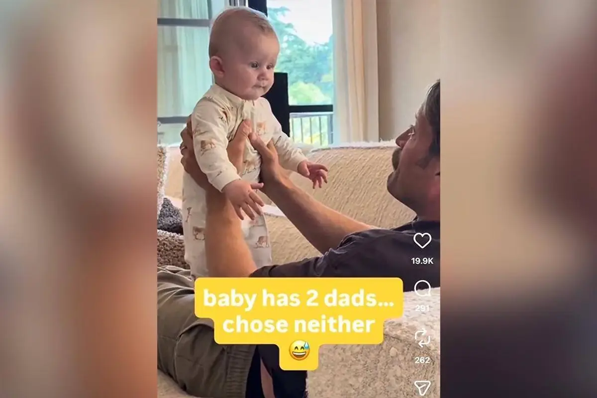 Baby cries for his mother, and his two dads think that it's hilarious