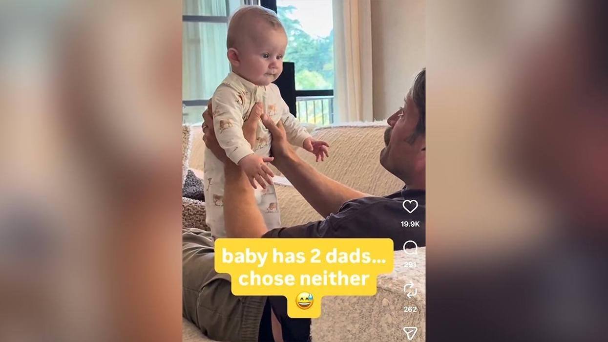 Baby cries for his mother, and his two dads think that it's hilarious