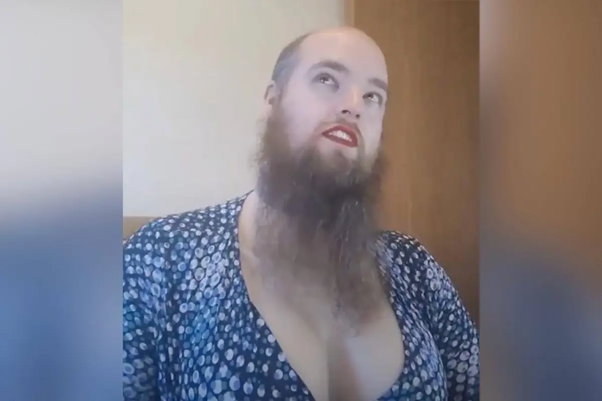 Male lecturer straps on huge, fake knockers before lecturing at a prestigious women's college