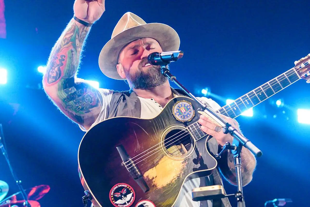 Zac Brown lets haters and losers know where to stick their outrage over him singing the National Anthem at UFC Freedom 250