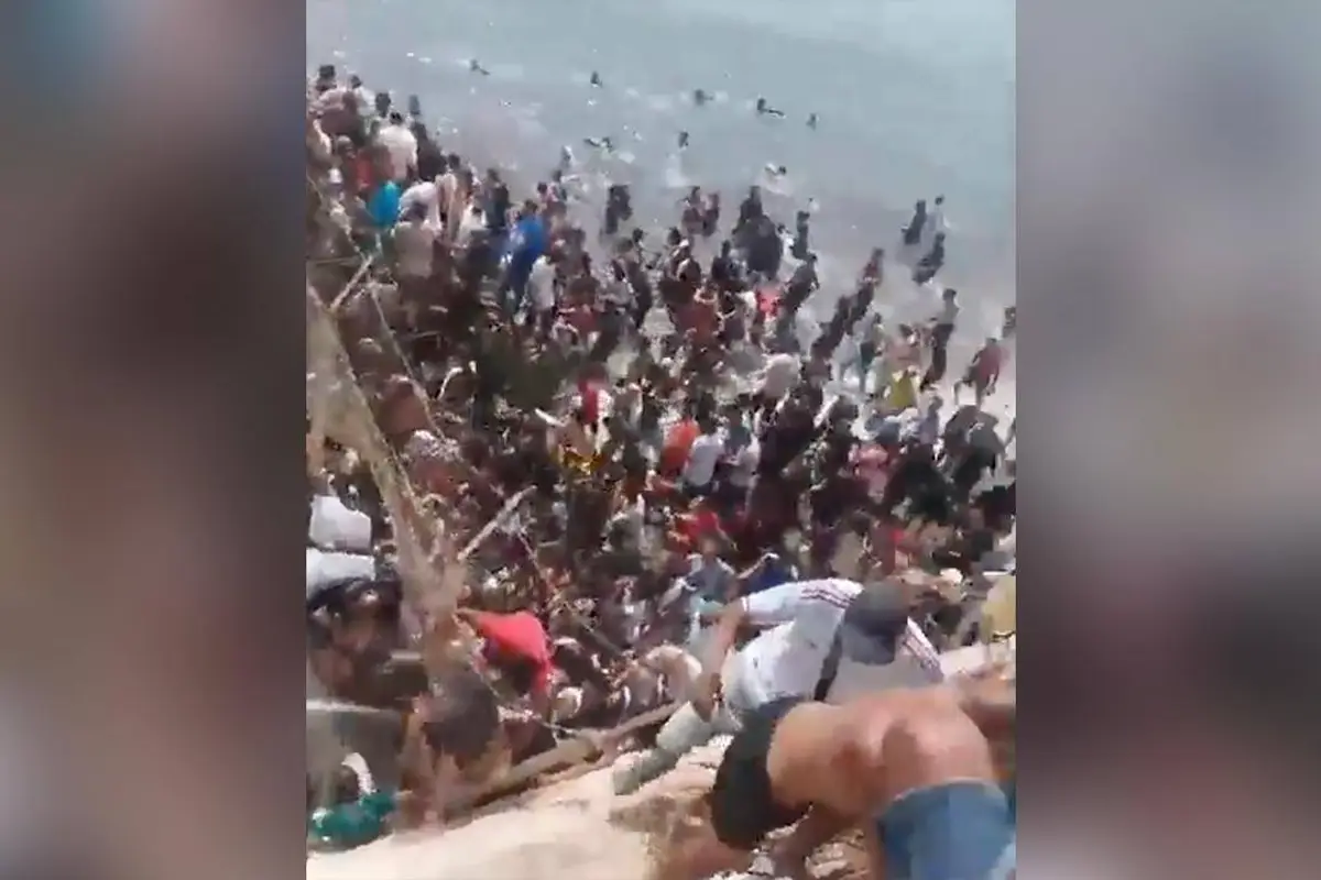 Chaotic Scene Shows African Migrants Storming Spain’s Port