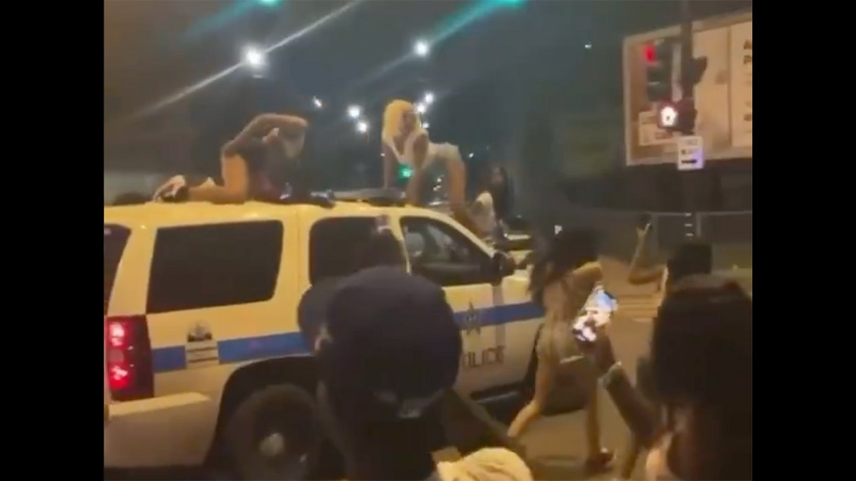 Disgusting Video Shows Women Twerking on Moving Cop Car, Because ... Justice?