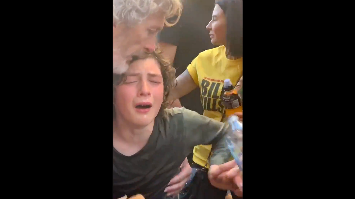 Authorities Pepper Spray Kid at Anti-Lockdown Protest. She Was Holding a Sign That Said 'Let Me Play'