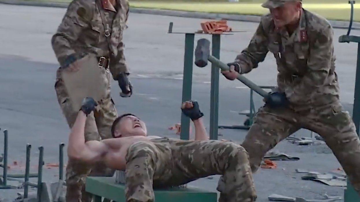 Watch: North Korean Soldiers Perform for Supreme Leader by ... Smashing Bricks on Themselves?!