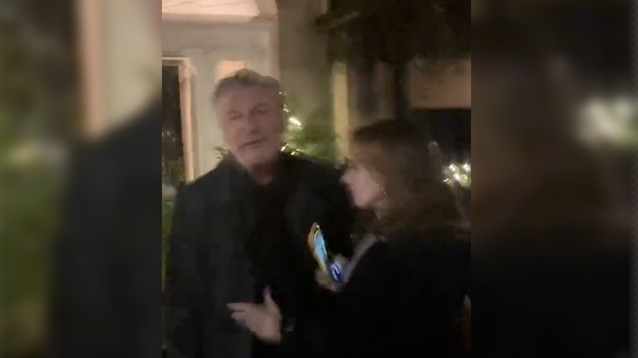 Watch: Alec Baldwin, Who is Under Investigation, Freaks Out on Reporter and Needs His Wife to Hold Him Back