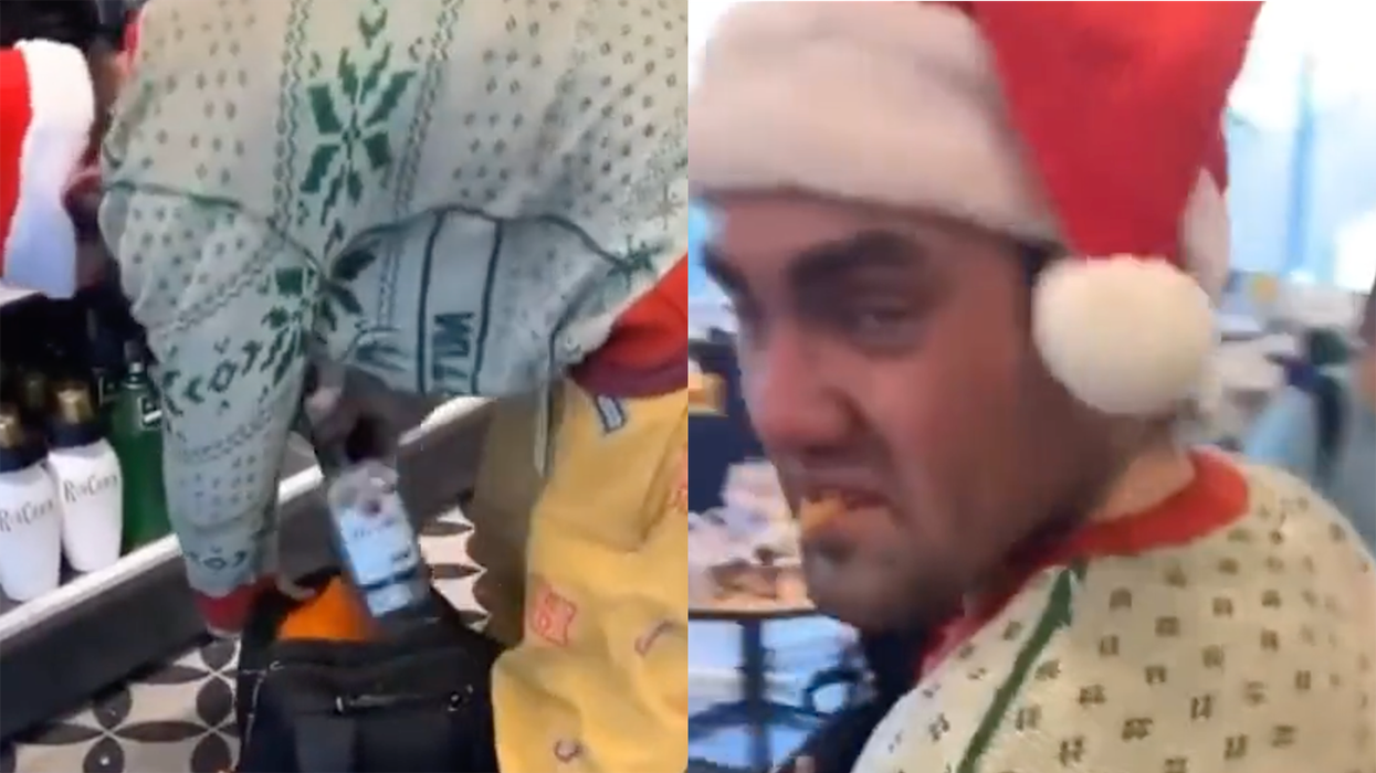 Watch: Guy Dresses Up in Christmas Hat and Ugly Sweater to Steal Booze from Target, Casually Walk Out