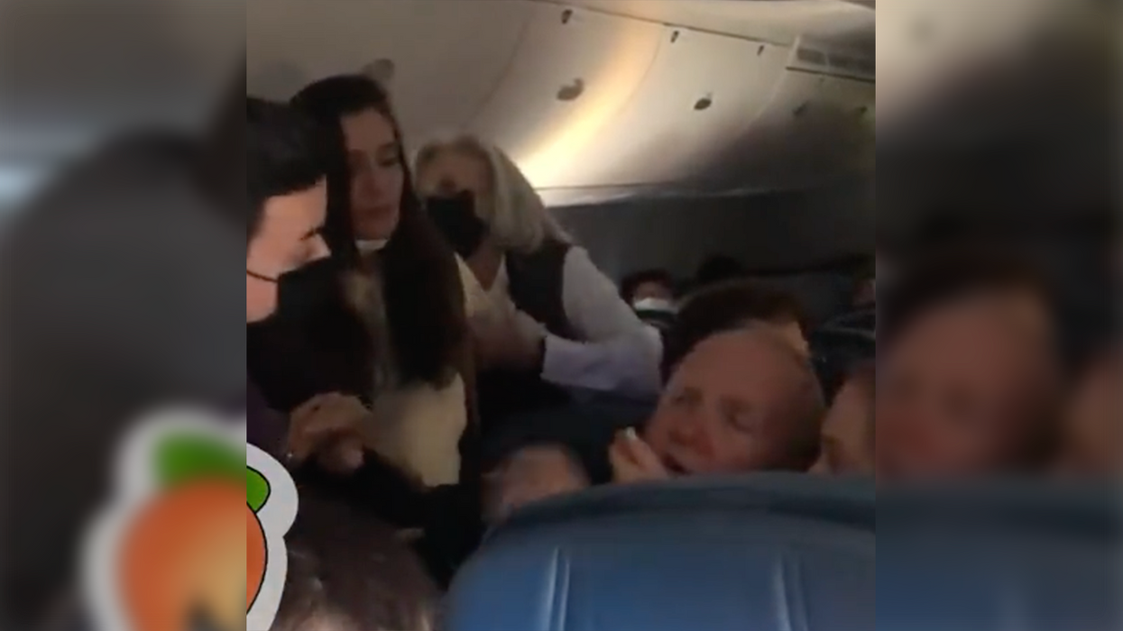 Watch: Crazy Lady Assaults Elderly Man Mid-flight, Screaming 'Put Your F***ing Mask On'