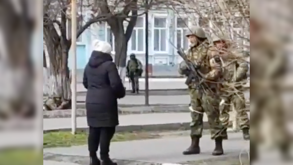 Watch: Ukrainian Woman Gives Russian Soldier Sunflower Seeds So Flower Can Grow When He Dies on Ukraine Soil