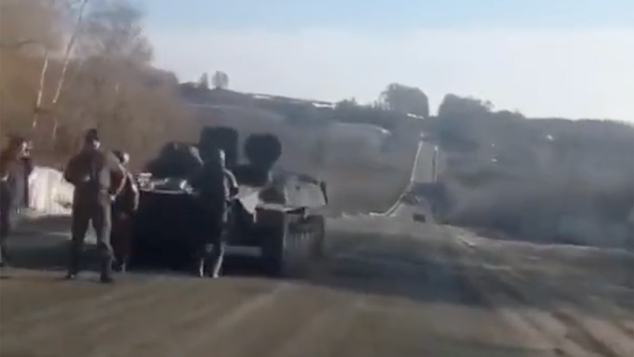 Watch: Russian Tank Runs Out of Gas En Route to Kyiv, Ukrainian Dude Pulls Over to Laugh at Them