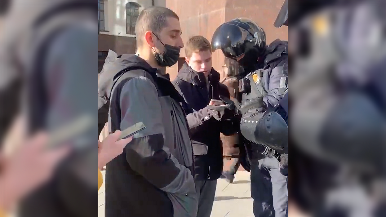 Watch: Russian Police Stop People in Public, Demand to See Private Messages on Their Phones