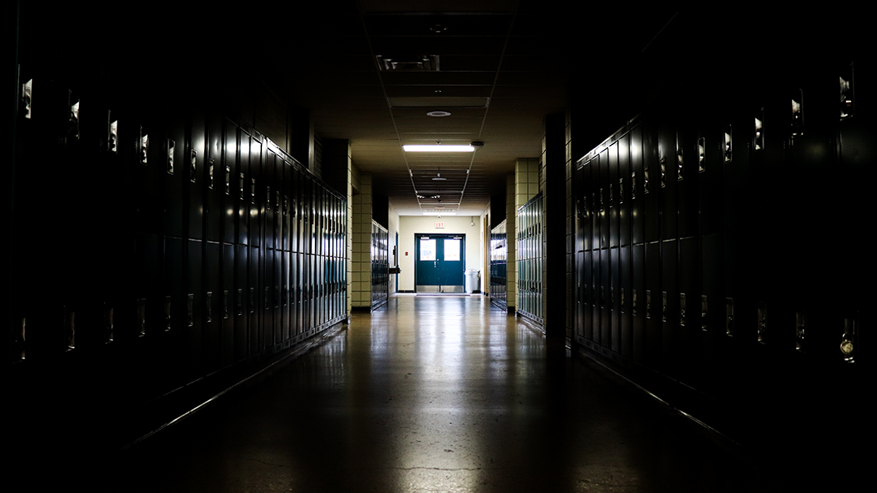 Authorities Arrest Administrator at Swanky Private School on Five Counts of Child Pornography