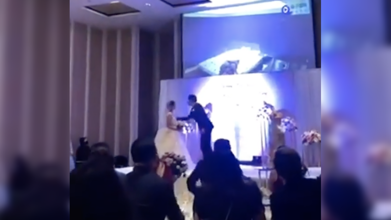 Groom exposes bride for cheating on him by airing video of the deed during their wedding ceremony