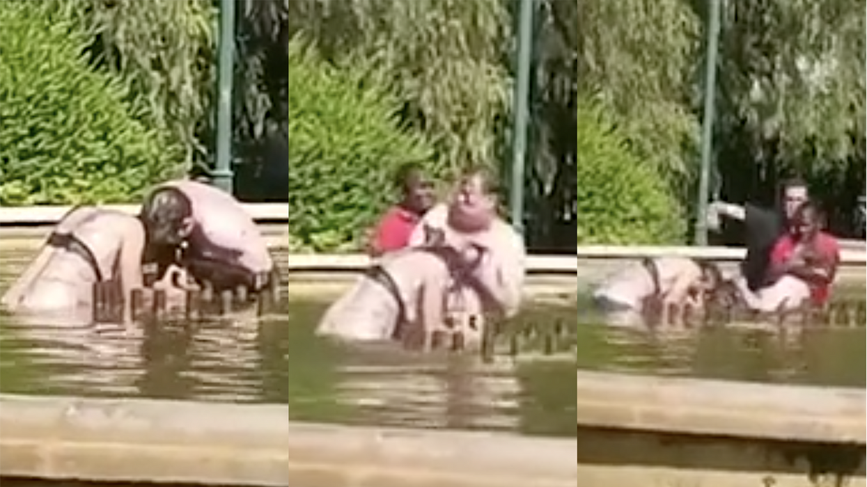 Video captures bystanders beating down some dude who was choking a woman in a public fountain