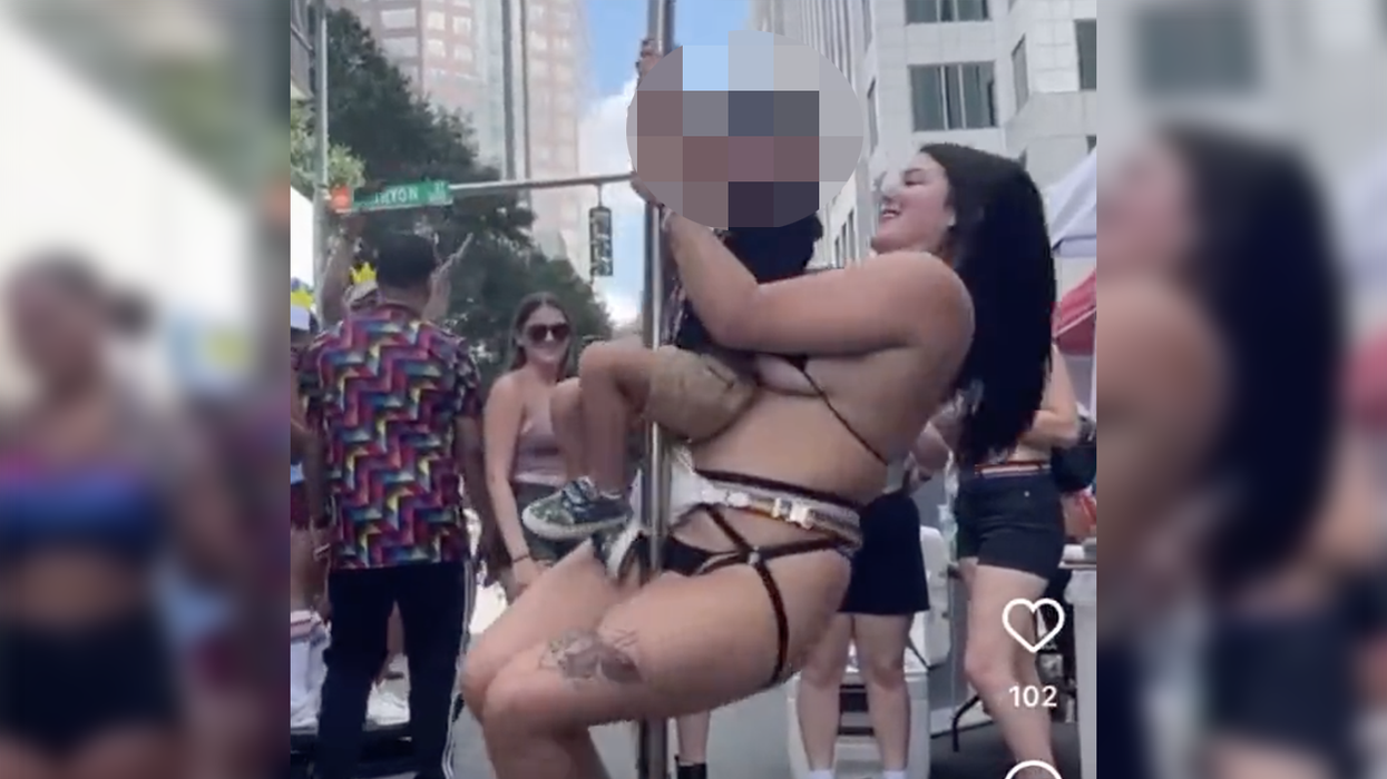 Stripper goes viral giving little kid a ride on her pole at a parade while other grown adults celebrate