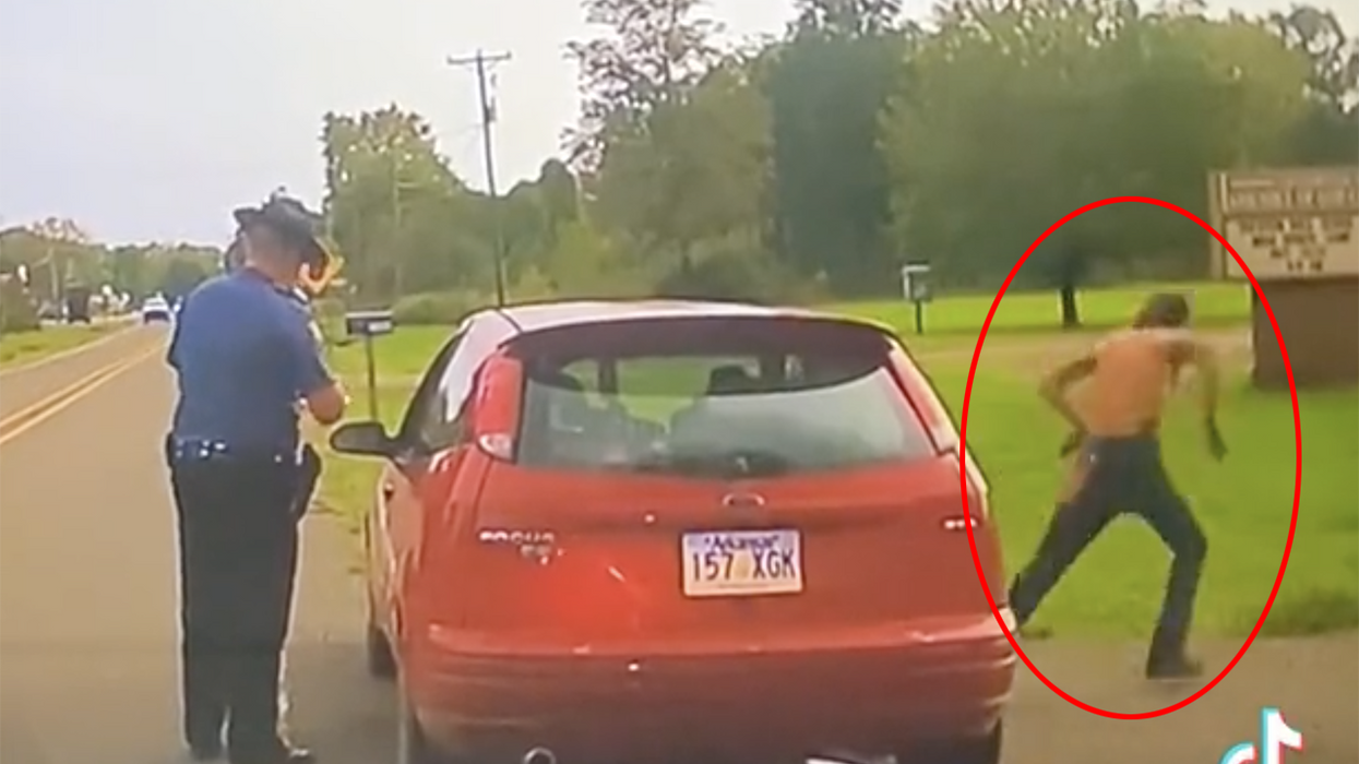 'You're good, bud!': Man books it during traffic stop for no reason, only to give the officer a reason