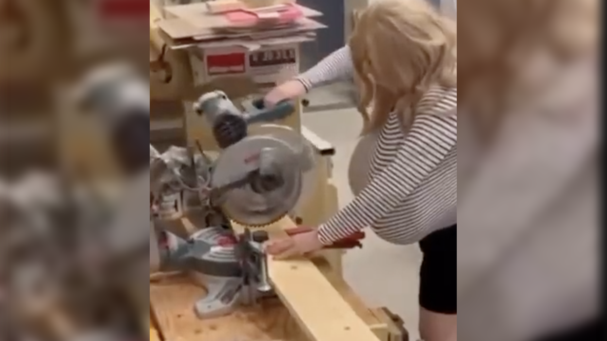 Shop teacher goes viral for enormous breasts, turns out to be a dude identifying as a woman and wearing falsies