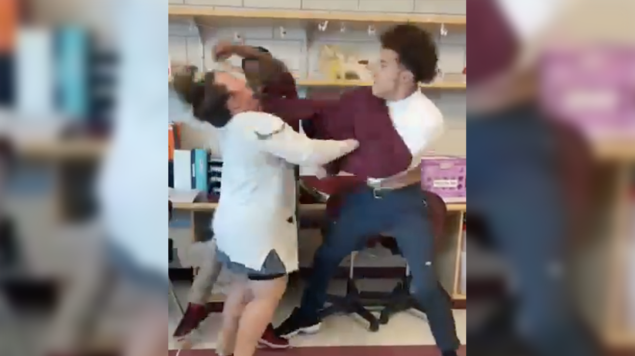 Watch: Male punk sucker punches female teacher who attempted to break up a fight in her classroom
