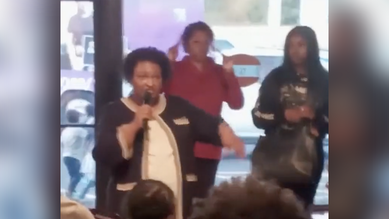 Watch: Stacey Abrams busted giving in photo op, tells certain people to socially distance for 'social media'
