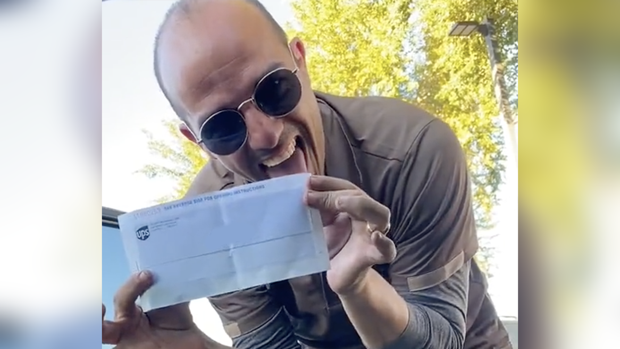 Watch: UPS driver receives first paycheck after fleeing Castro's Cuba and his patriotic joy is infectious