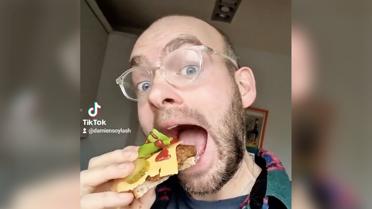 Watch: Weird dude is way too excited for you to try his burger made of bugs