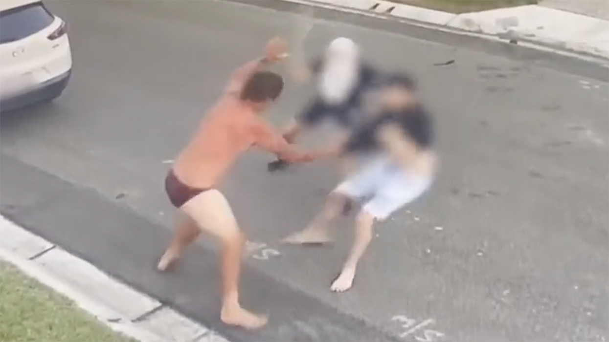 Watch: World's greatest hero fights off armed assailants in his underpants, uses one as a human shield