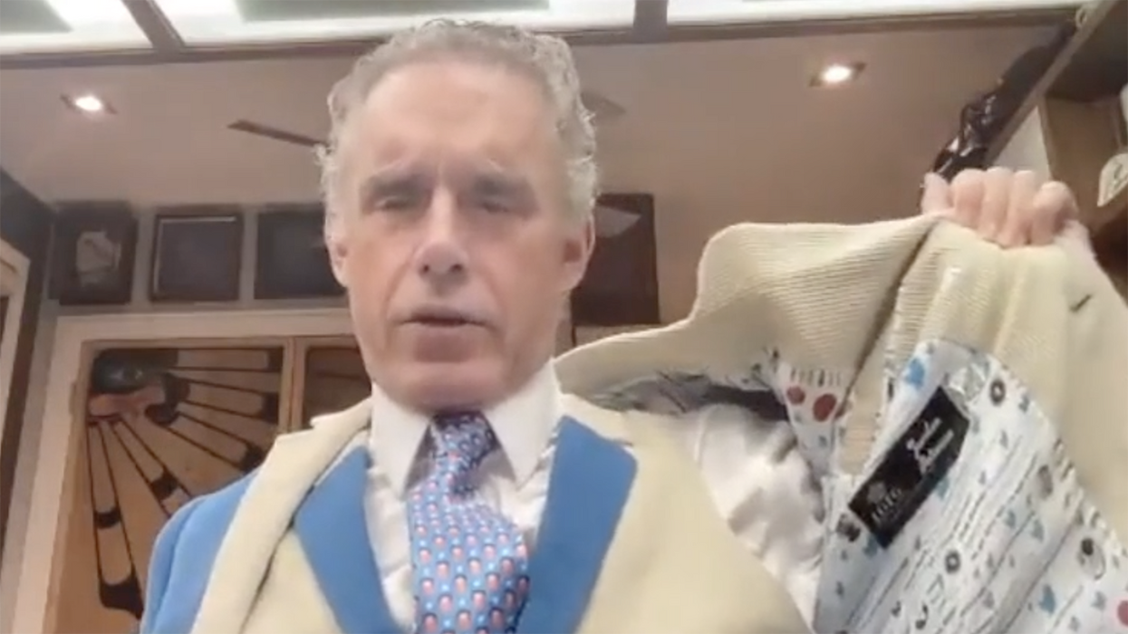 Watch: Jordan Peterson shows off that Big Tech drip in his new Twitter suit, complete with an Elon Musk tie