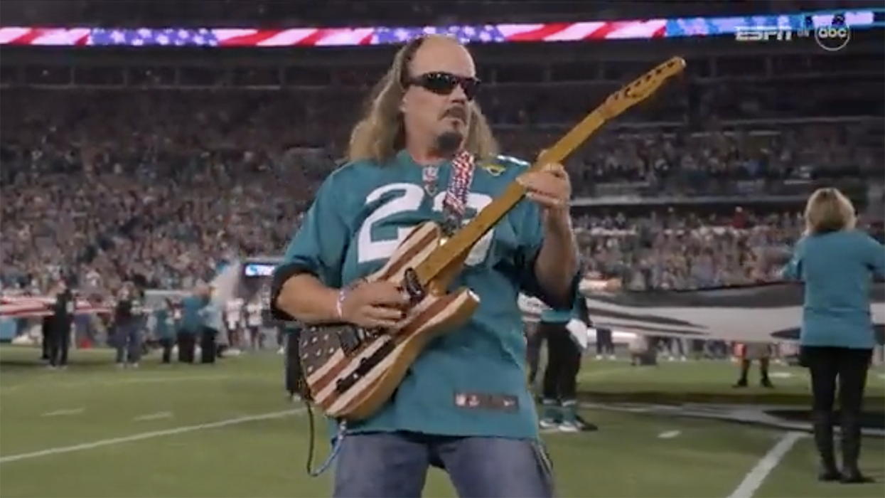 Watch: Dude with sweet mullet plays our National Anthem on the electric guitar before the Jaguars game and it SHREDS