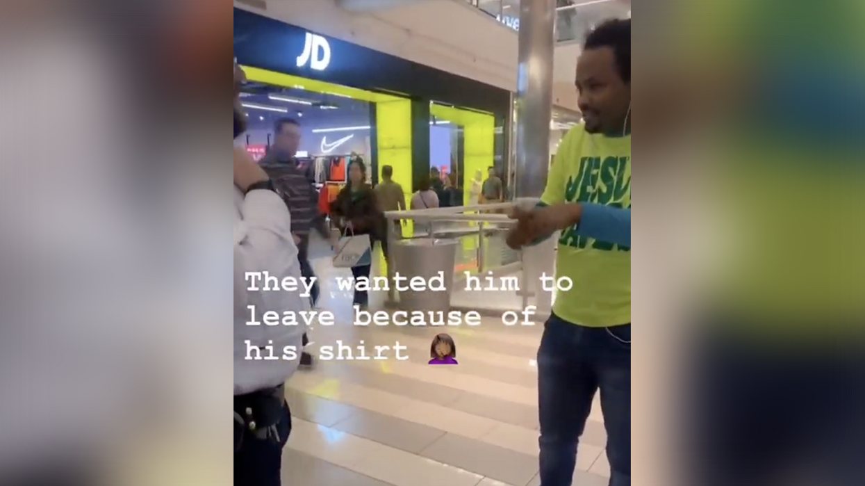 Watch: Security accosts man to remove his offensive shirt or leave the mall. It said "Jesus Saves."