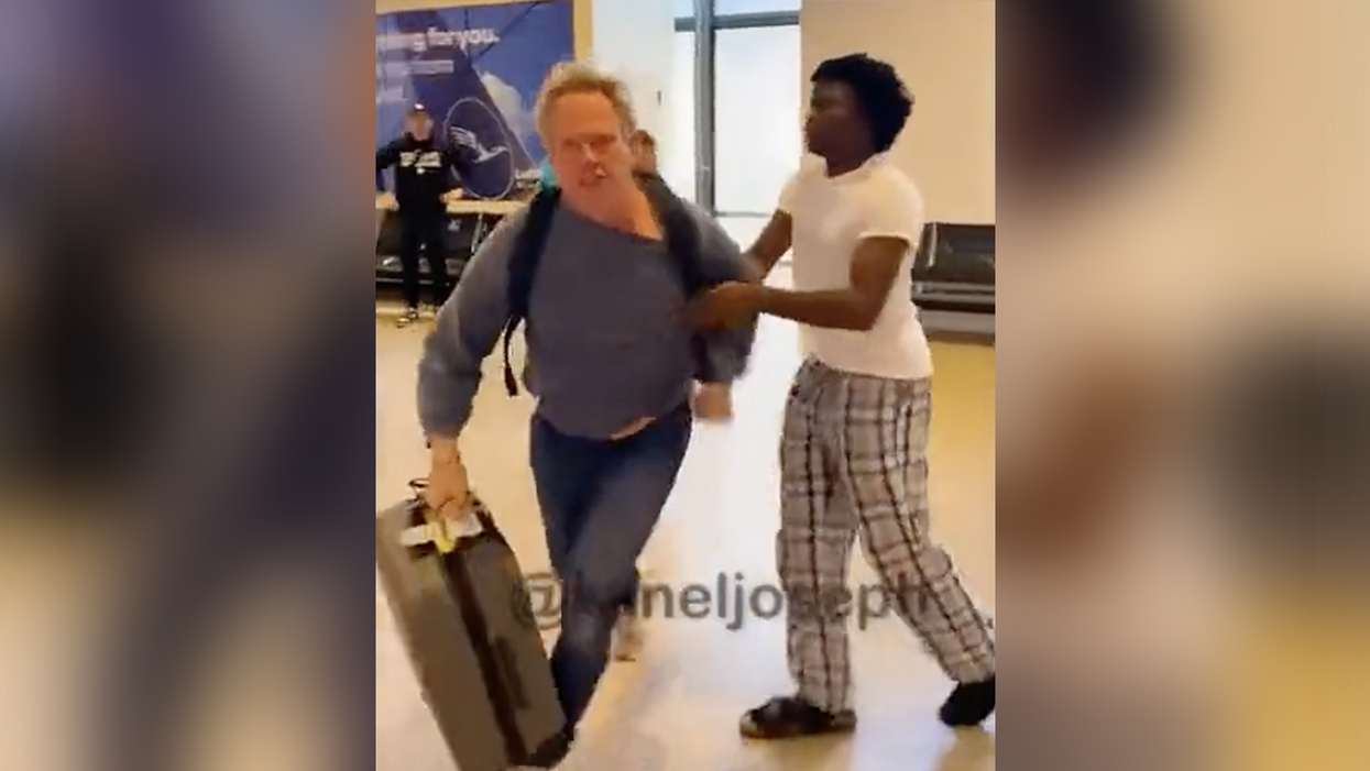 Watch: YouTubers who pretend to steal your luggage at the airport as a 'prank' meet someone who didn't find it funny