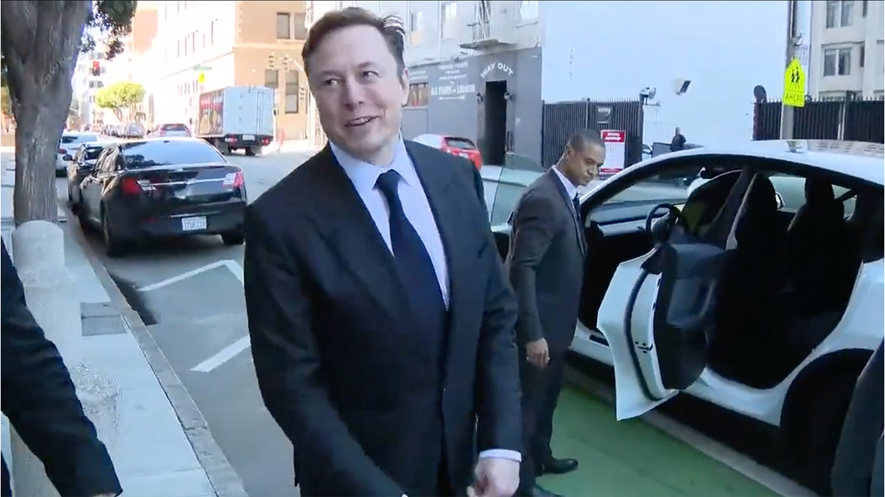 Elon Musk found not liable in fraud trial, then turns questions around on reporters as he leaves