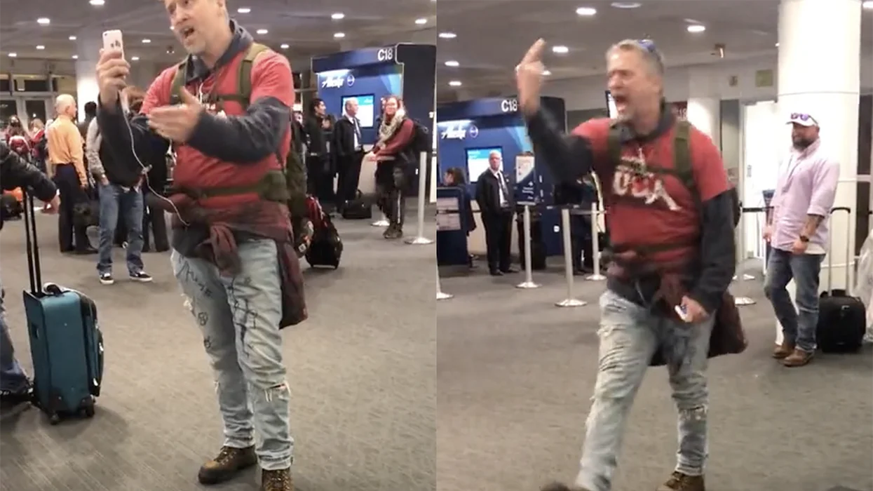 Watch: Dude's epic airport meltdown includes busting out church hymns and Eminem lyrics
