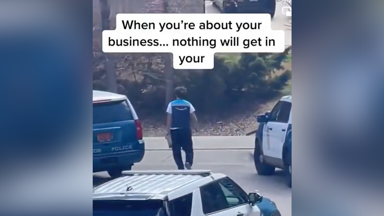 Watch As This Fearless Amazon Worker Braves A Police Standoff To Deliver His Package On Time