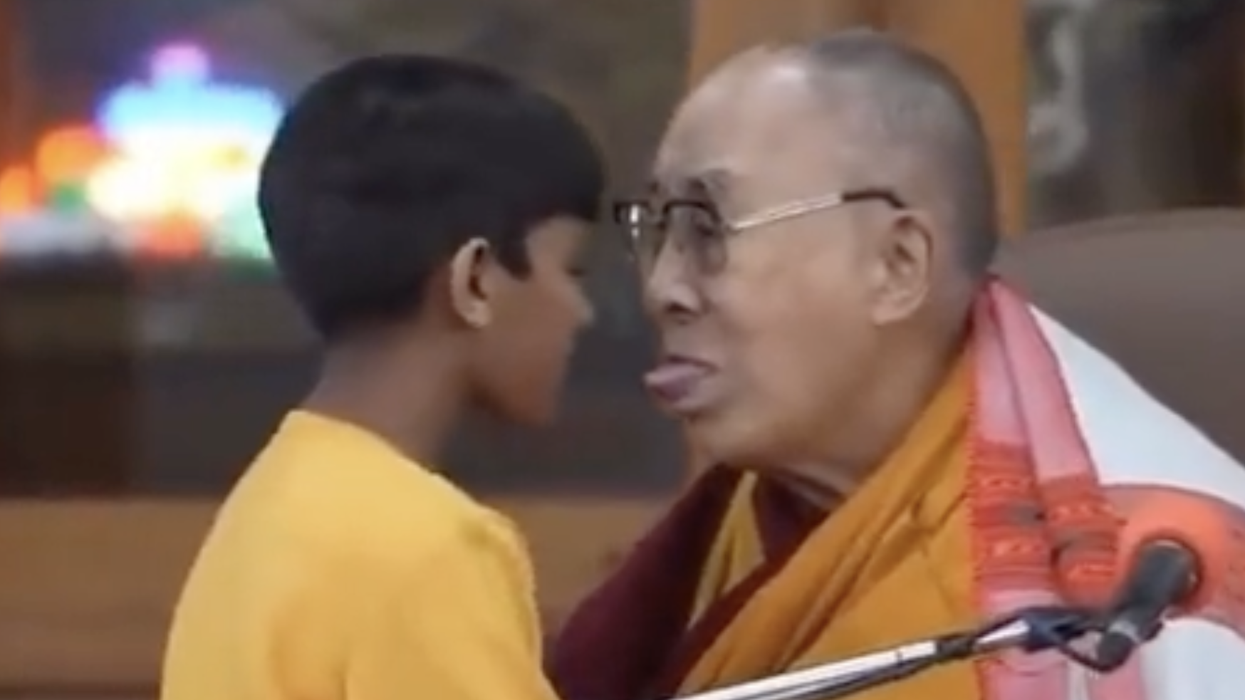 Watch: Dalai Lama tries tongue kissing little boy, but it's okay though because he's super sorry about it