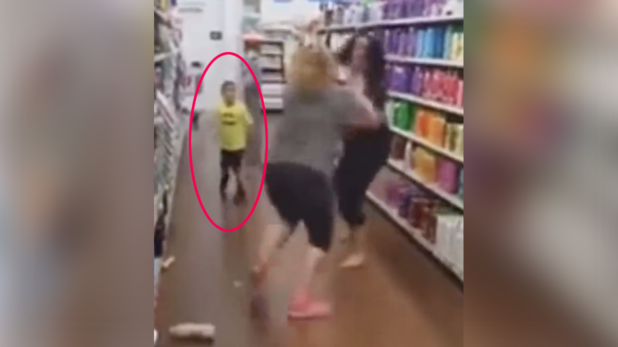 Watch: Mommy fight breaks out while one of their kids watches, who then jumps in the fight himself